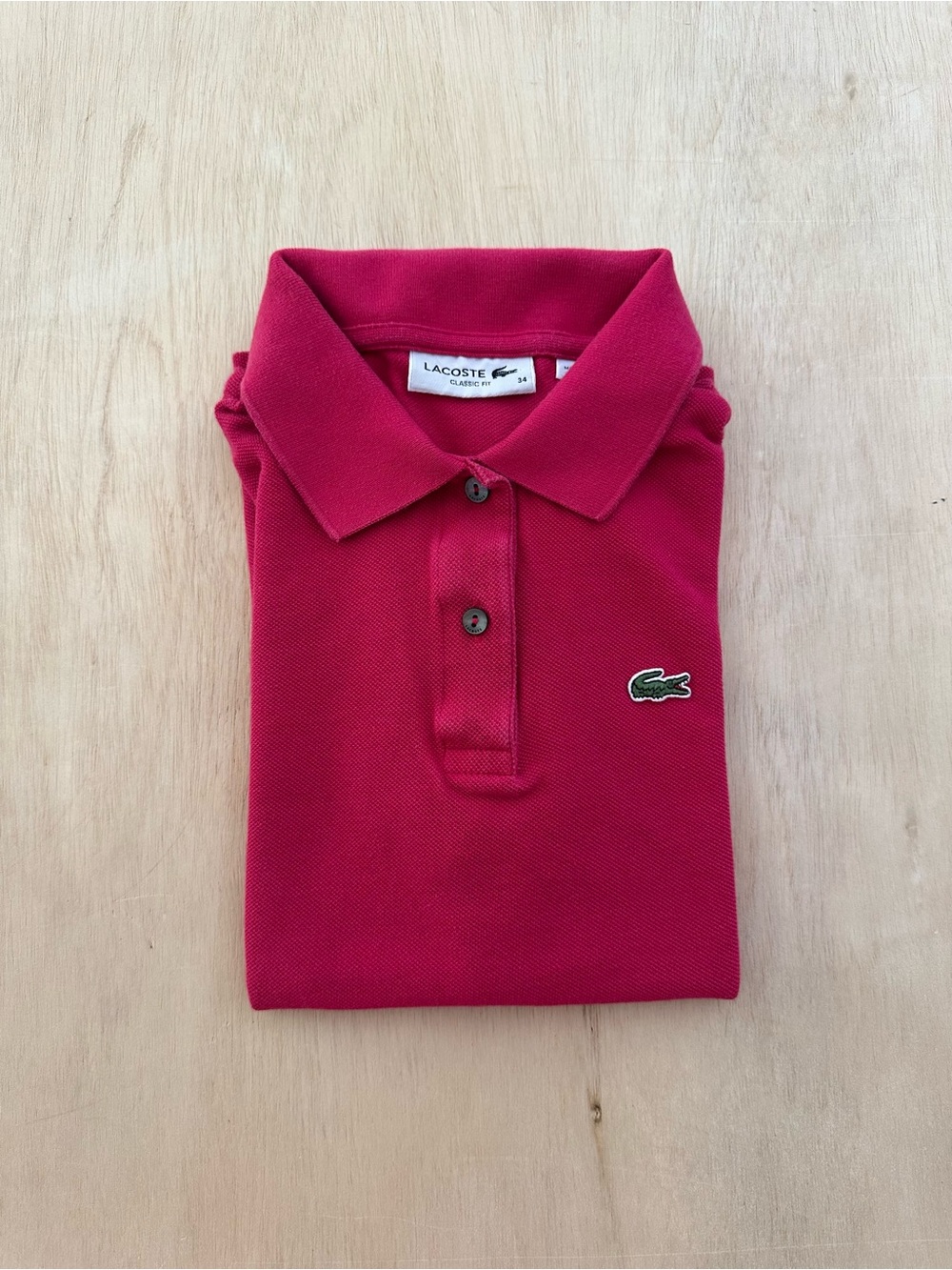 Lacoste Women's European size 34 Raspberry Polo Shirt